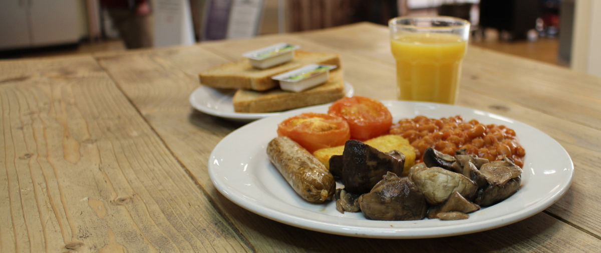 Vegetarian breakfast with toast and orange juice